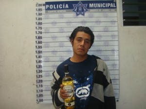 Robo una botella de licor