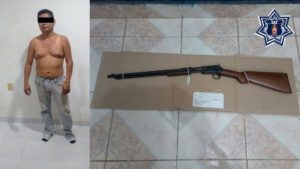 José Juan FA portaba un rifle calibre 22 marca Winchester de varilla, con capacidad de 16 cartuchos.