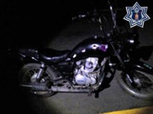 Motocicleta con el número de serie visiblemente alterado.