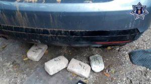 Cuatro paquetes con un peso de tres kilogramos y medio.