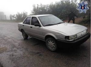 Nissan Tsuru gris, placas SG34205 de Puebla y serie 3N1EB31S5YL164024.